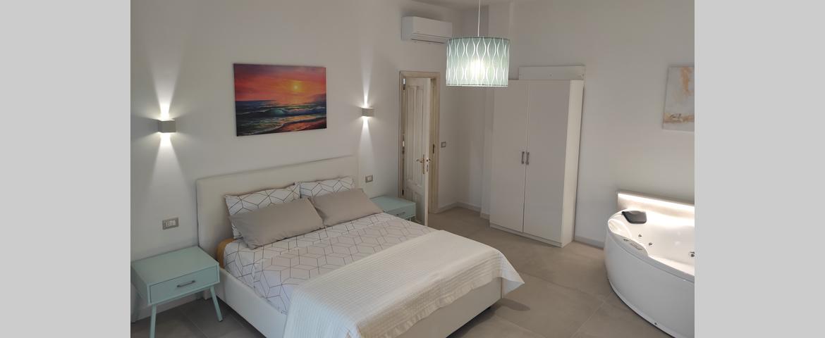 Suite Deluxe con vasca idromassaggio Suite Deluxe con vasca idromassaggio